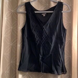 Ann Taylor blouse 100% silk with polyester lining.